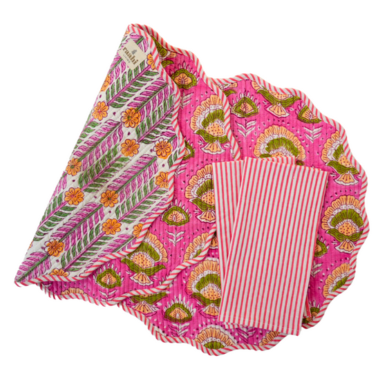 Image showing hand block printed reversible placemats and striped napkins, crafted from organic cotton in Jaipur. Quilted design adds texture and durability. Ethically made by family-run ateliers, showcasing traditional craftsmanship